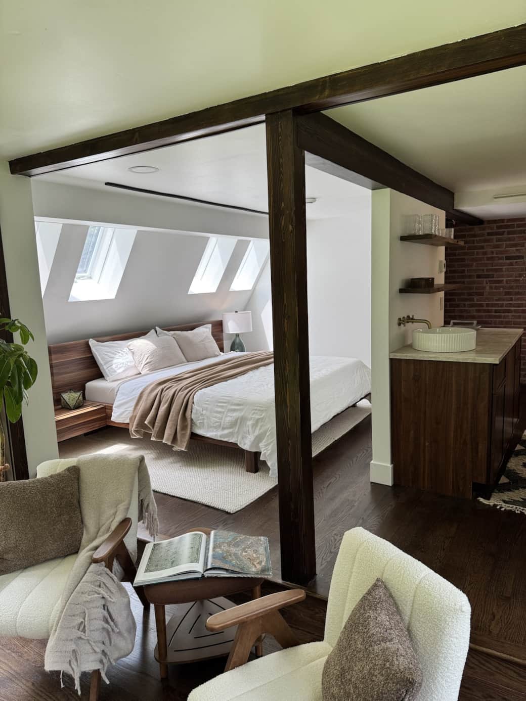 Spacious main-floor king suite with a private wet bar, mini fridge, office desk and a relaxing atmosphere.