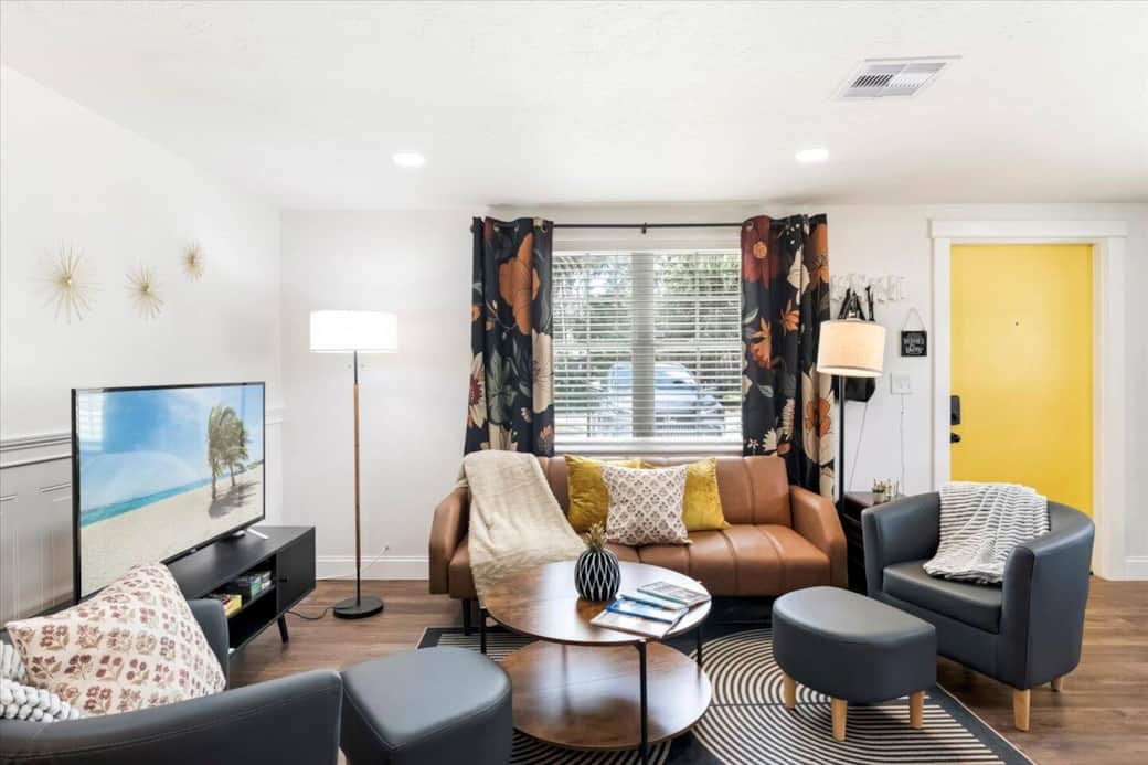 Living Room – “Lights, Camera, Relaxation!”
Kick back in style—this roomy mid-century lounge features a cozy sofa that converts to a double bed for star-quality comfort.
