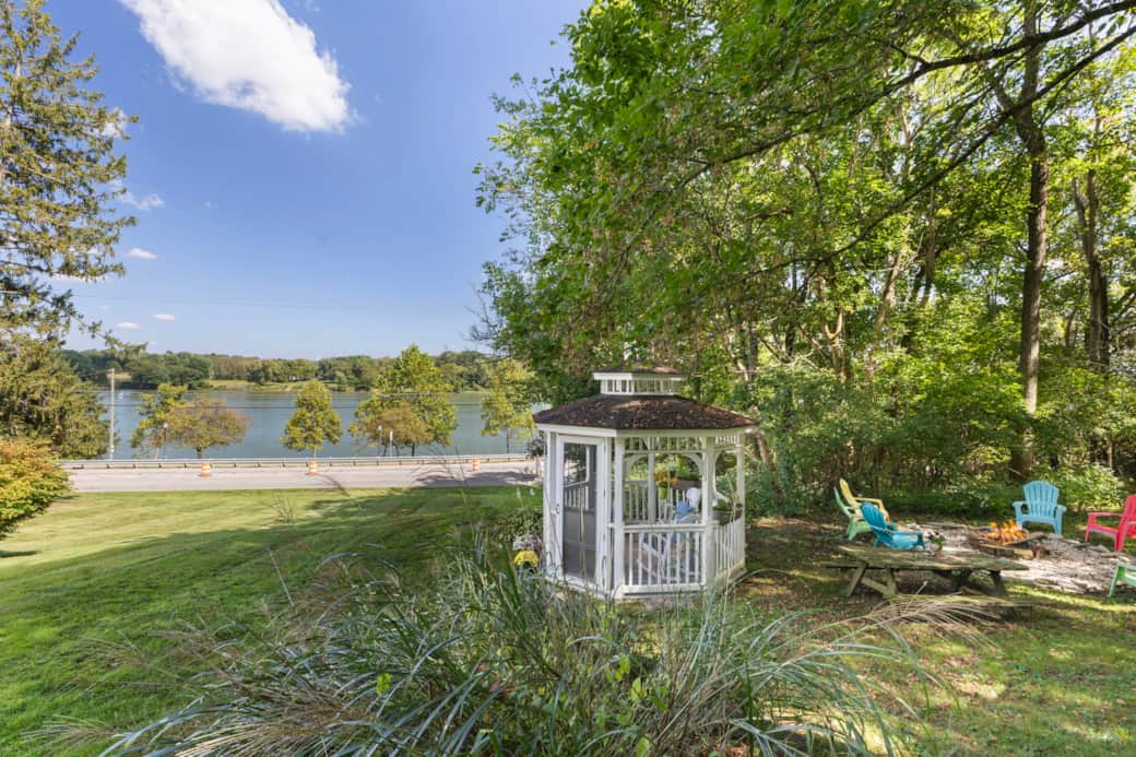 Gazebo and Firepit area on the property with river views. 