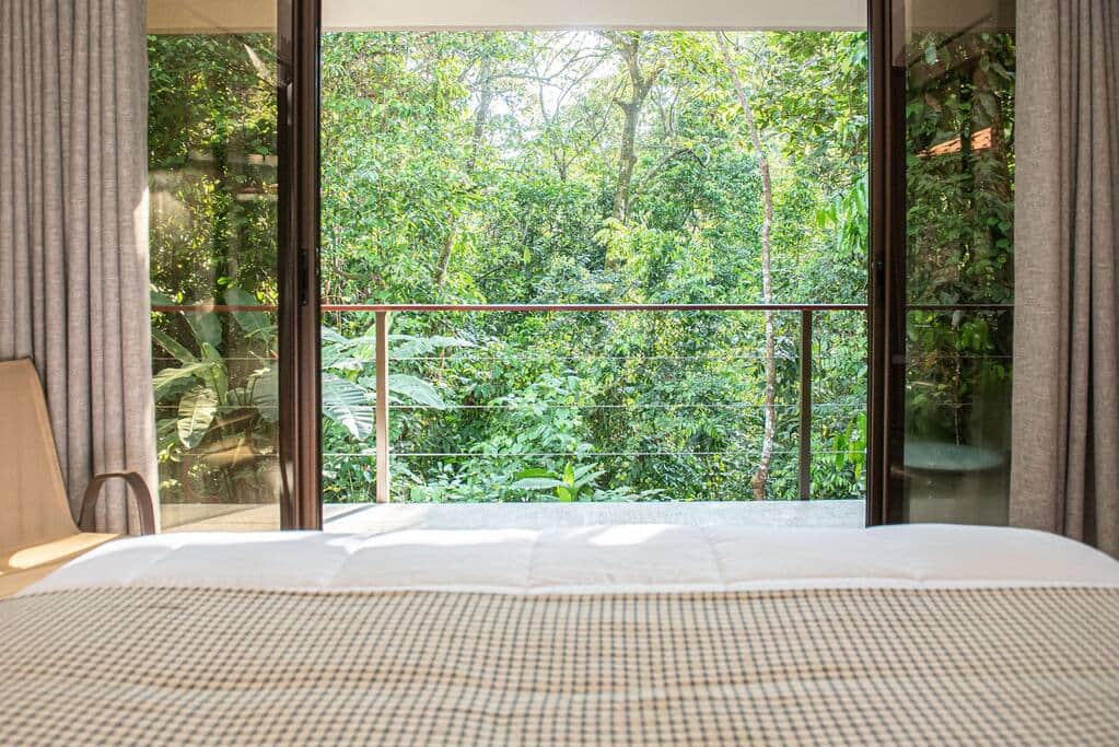 Wake up to this view. Each cabina has a king bed and large sliding doors