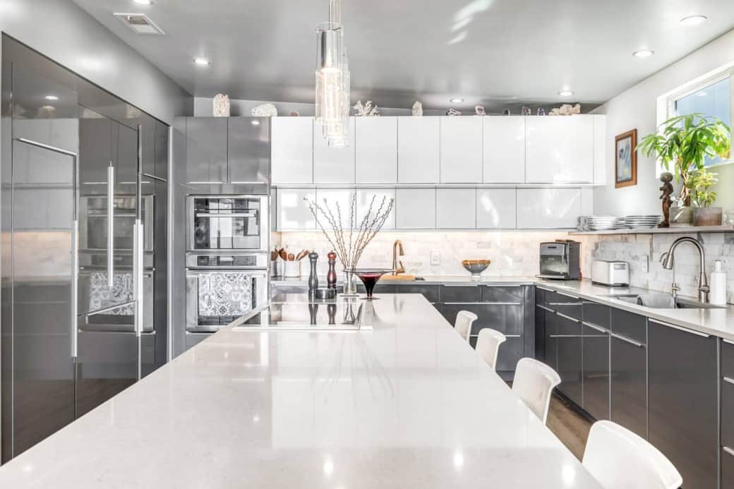 Chef’s kitchen, thermador refrigerator is on the left , induction stove top . Double oven, dishwasher , open shelving for dish and glass wear Chef’s kitchen, thermador refrigerator is on the left , induction stove top . Double oven, dishwasher , open shelving for dish and glass wear