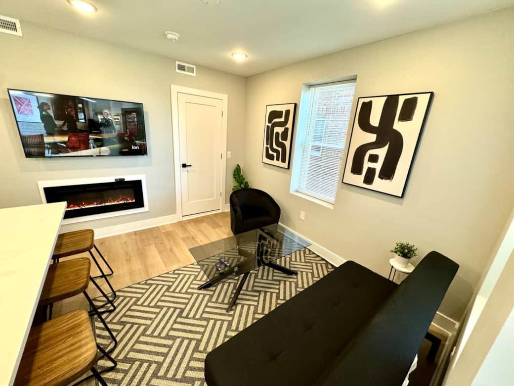 Brand new kitchen and appliances with breakfast bar, dishwasher ,microwave, refrigerator. 
Joined with the living room with  sofa bed, large flat screen tv , and a fireplace.