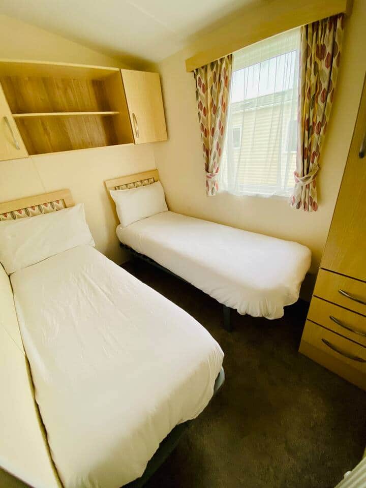 twin bedroom with wardrobe 