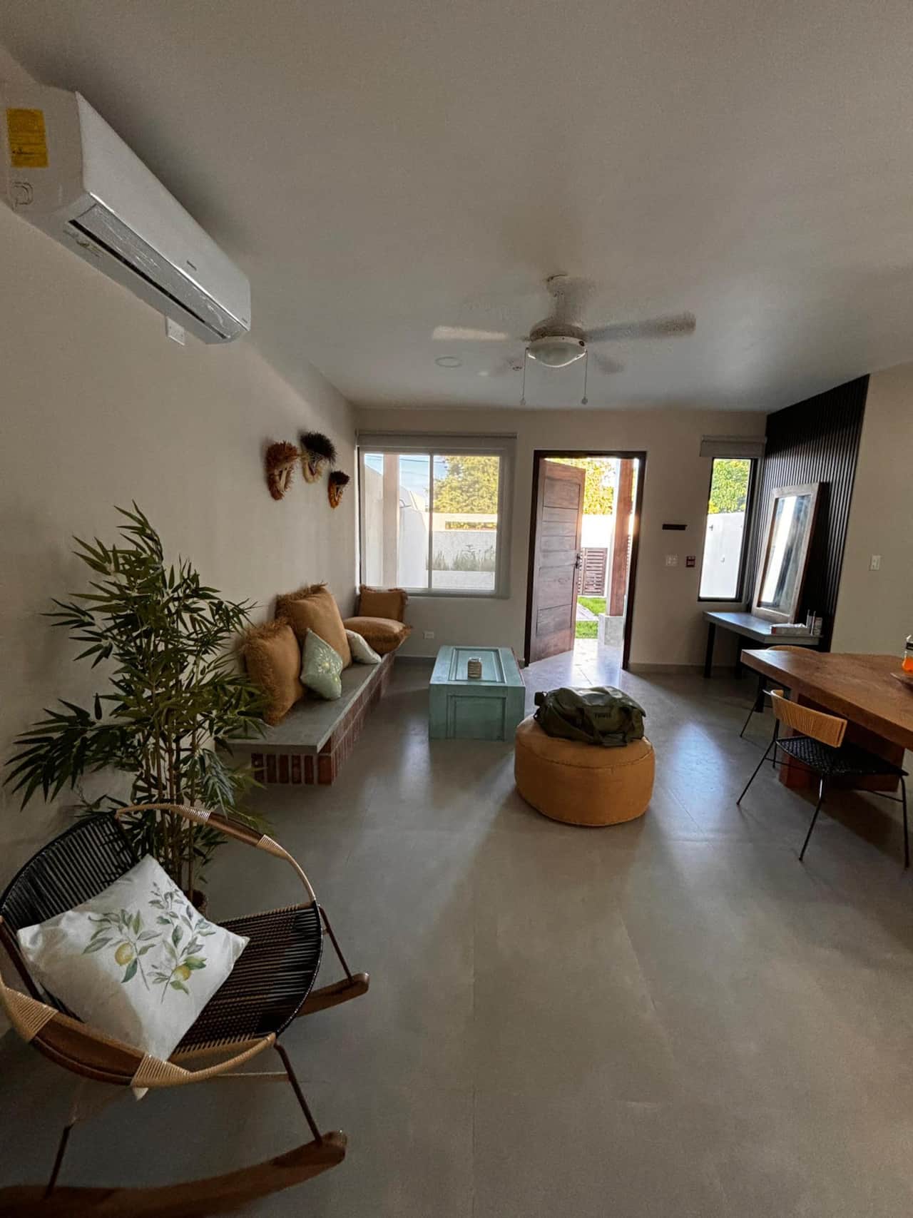 Sink into the airy, light-filled lounge of our sustainable cabin in Pedasí, Panama.