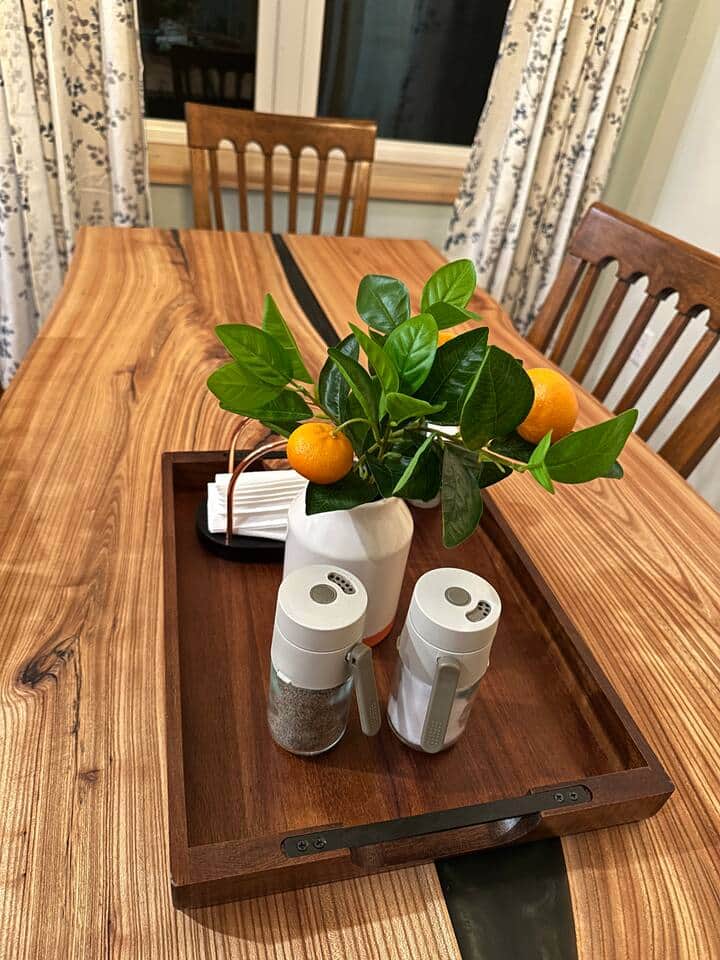 Custom-made dining table with live edge wood