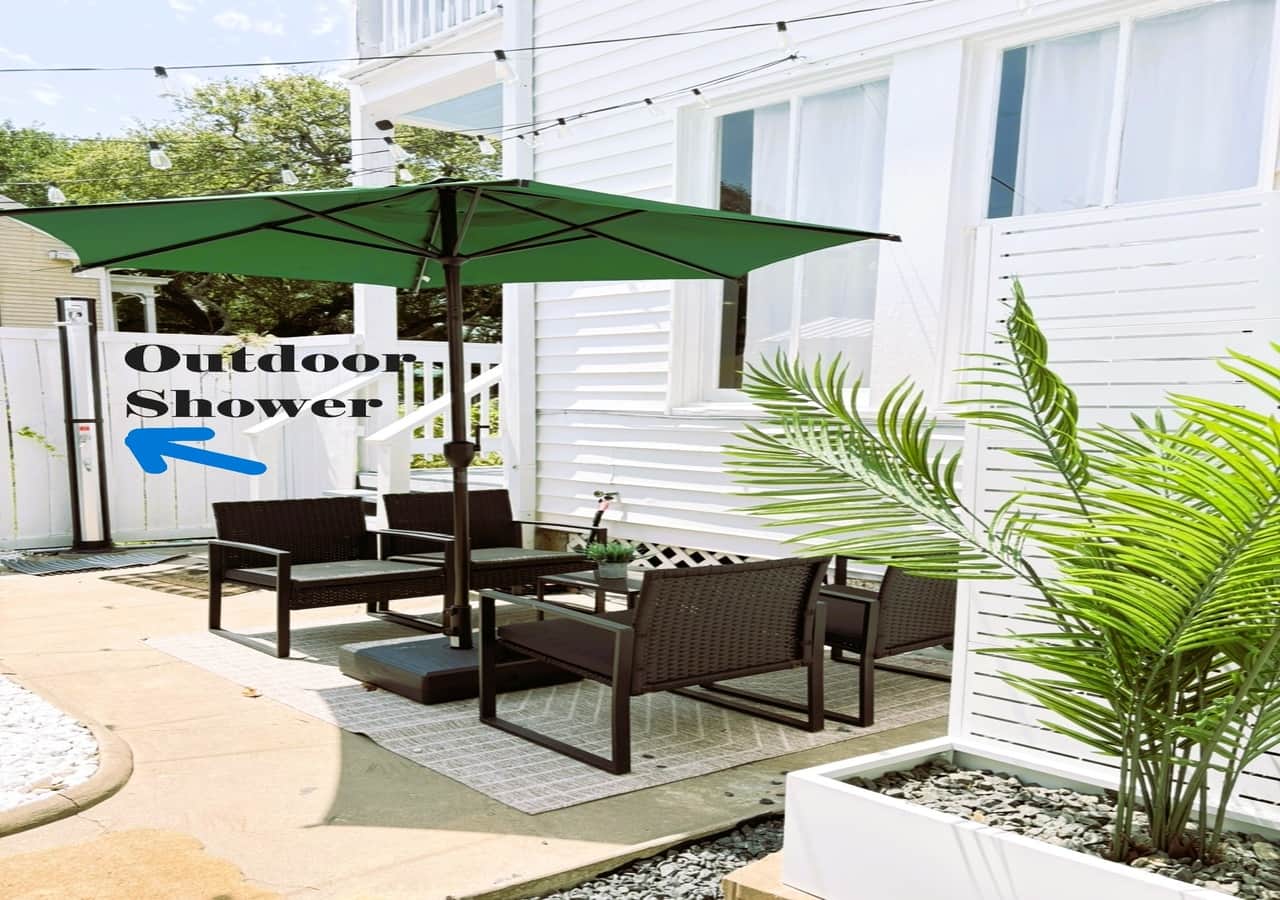 Modern outdoor shower to wash off the sand out the outdoor events of the day.
