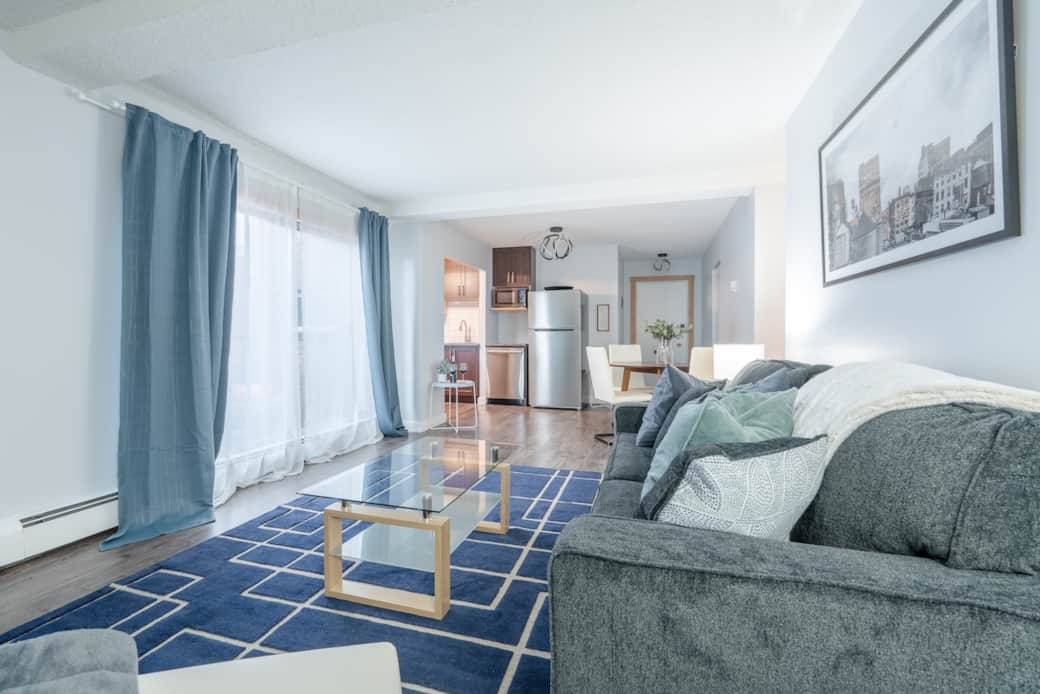 Open up the blinds to enjoy views of the city from the comfort of your living room. 