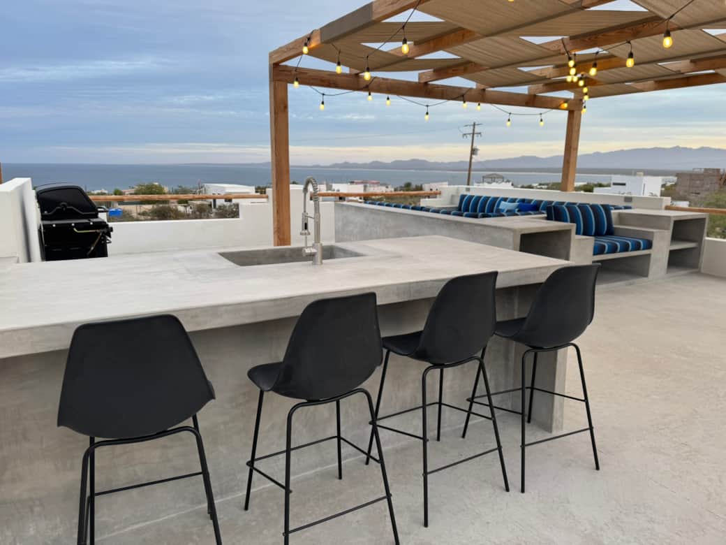 Rooftop BBQ, sink, and mini fridge. Perfect for a sunset drink or dinner