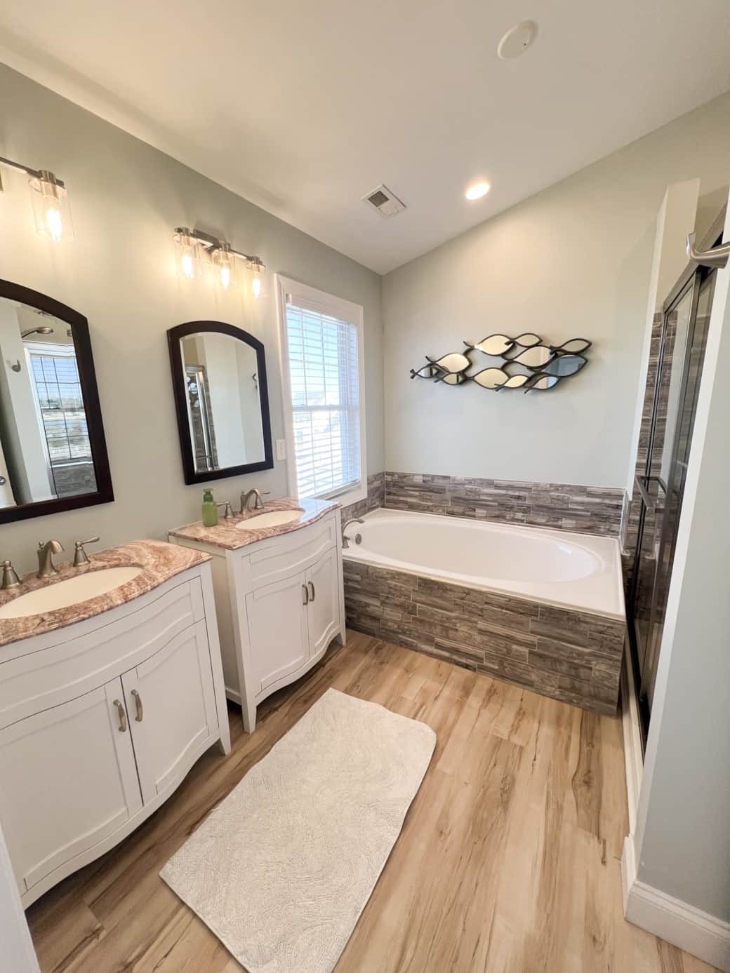 Primary Bath with walk in shower, dual vanities and large bathtub 