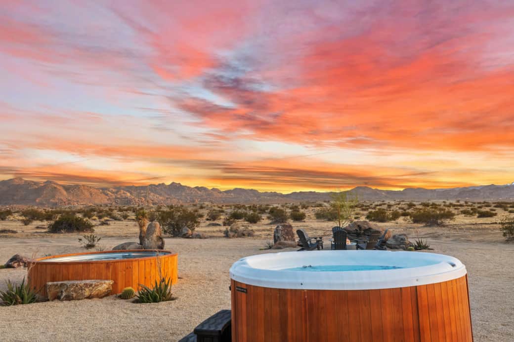 Cedar-wrapped jetted spa under Joshua Tree's famous cotton-candy sunsets