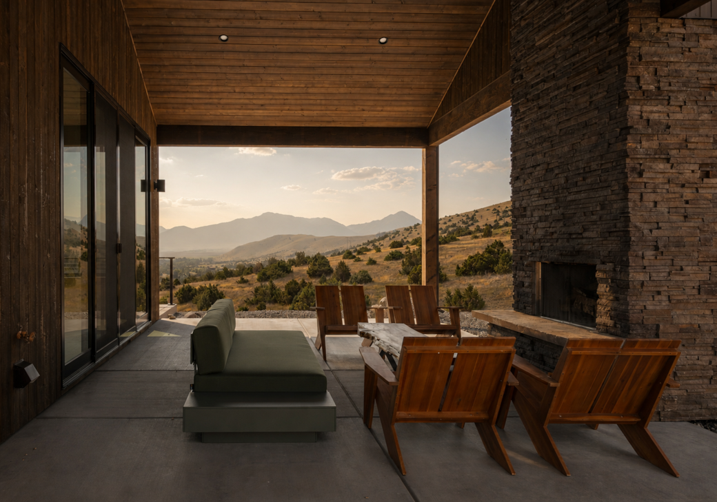 Enjoy sweeping views of the Absarokas from the covered side porch with wood burning fireplace Enjoy sweeping views of the Absarokas from the covered side porch with wood burning fireplace