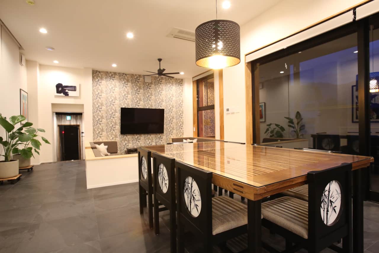 Looking back over the bespoke dining table to the sunken lounge. True Hakuba luxury accommadation. 