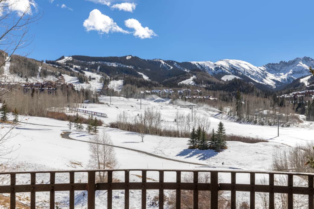 The home and main deck offer sweeping vistas of the Telluride Ski & Golf Resort with easy access 