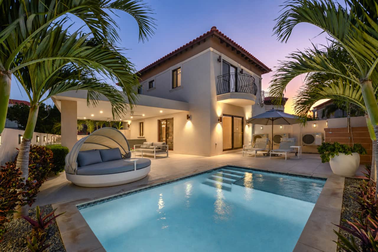 Backyard with private pool by night