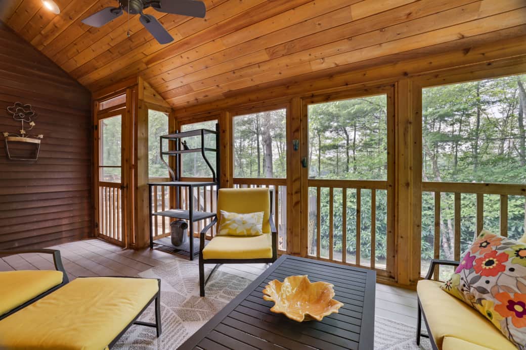Stone and cedar screened porch