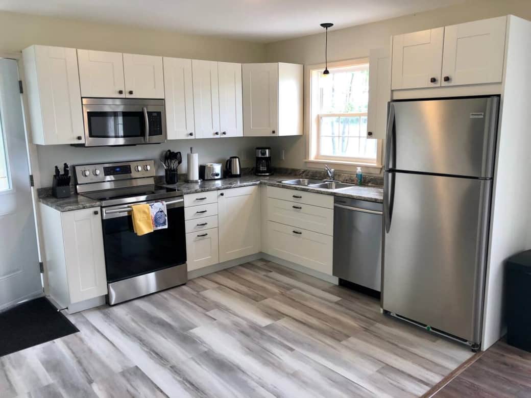 Kitchen with adjacent front door Kitchen with adjacent front door