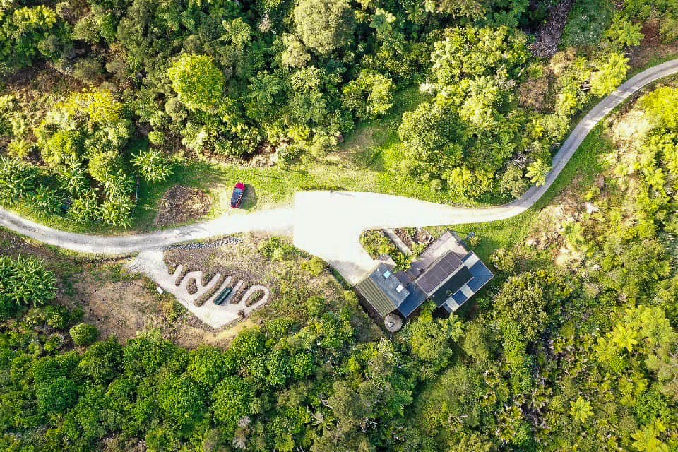 Aerial view of the lodge and vegetable garden