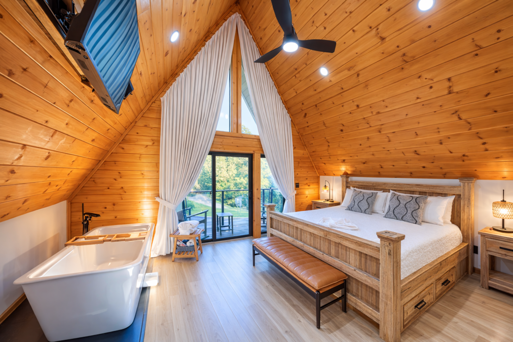Upstairs master retreat: jacuzzi tub, sunrise skylights, private balcony.