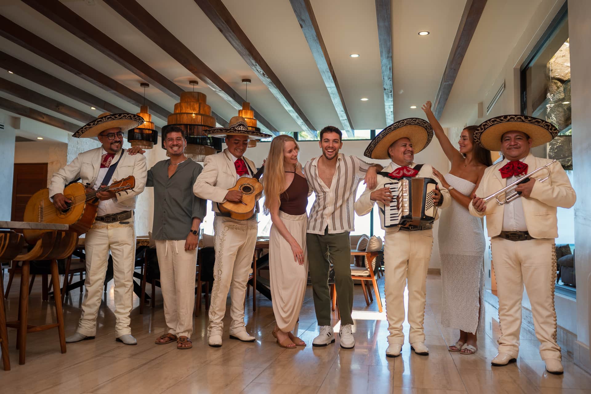 Guests celebrating a birthday with custom cake at Villa TuluMar