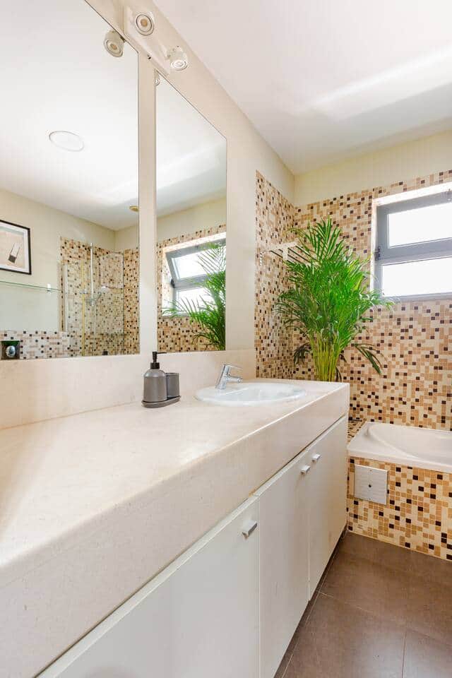 Full bathroom with bathtub and bidet.