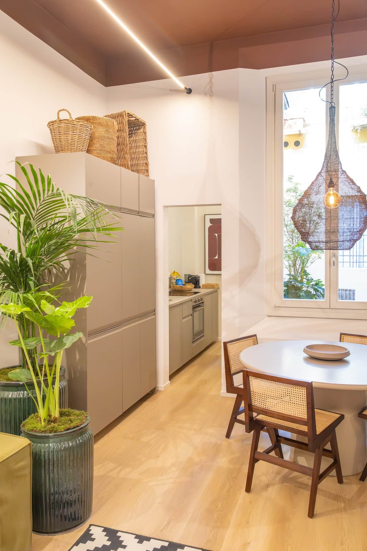 Design living area in via Santo Stefano, living room with relax area and convivial table.