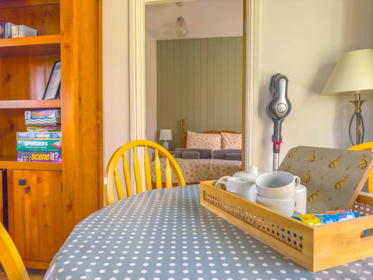Dining room with bedroom in the background