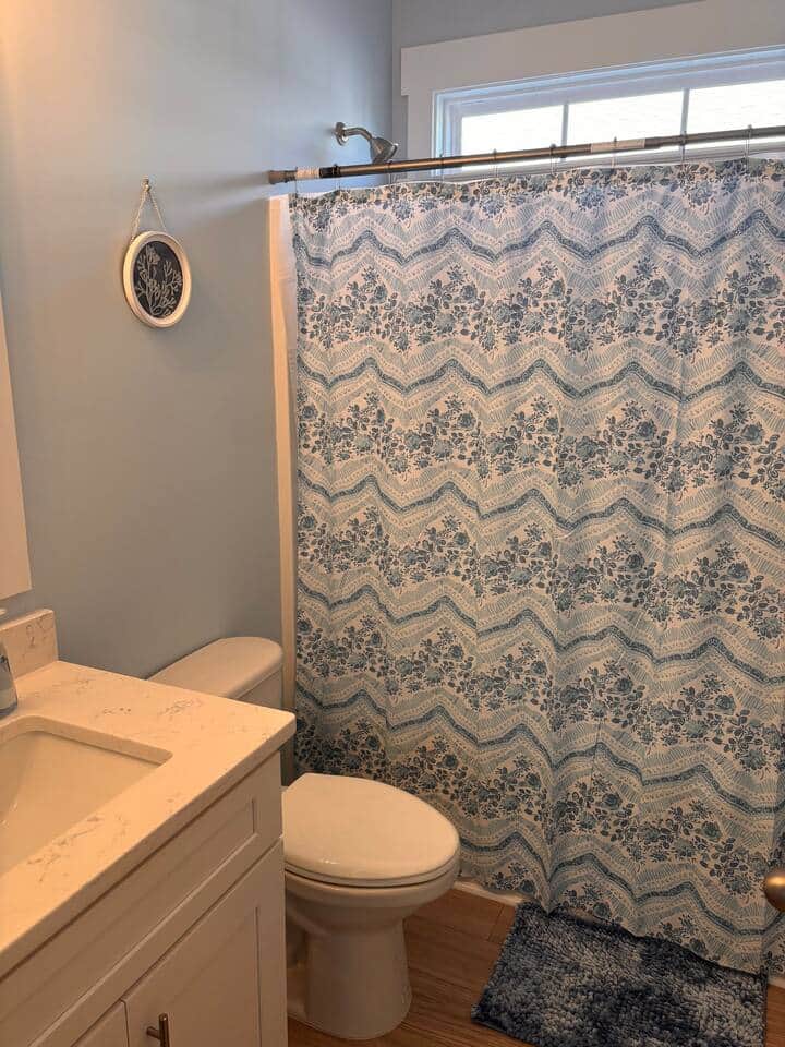 Guest bathroom with tub