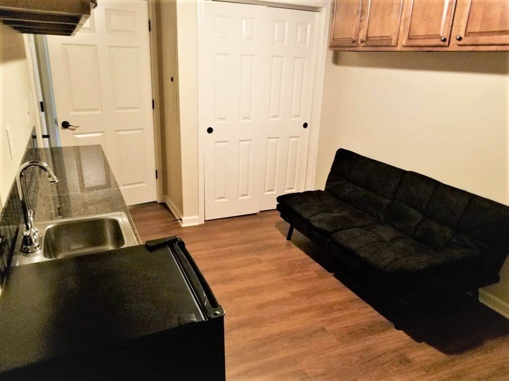 Kitchenette includes sink, small refrigerator and microwave with extra storage throughout. Kitchenette includes sink, small refrigerator and microwave with extra storage throughout.