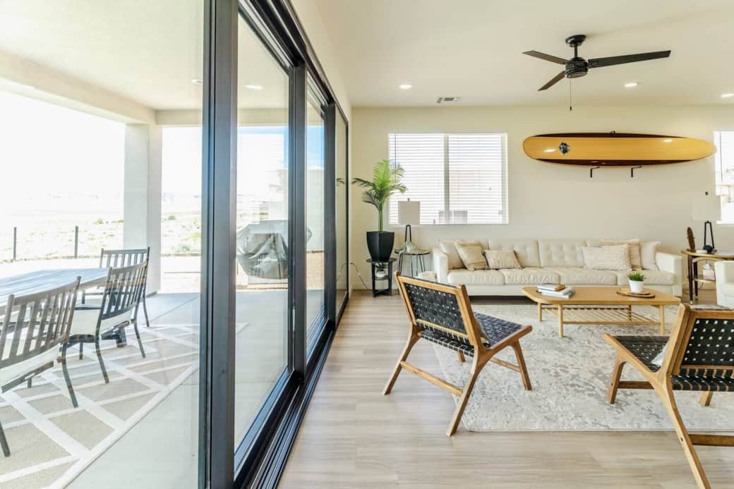 Beautifully and decorated with a modern surf theme. Enjoy the open and light living room space or step outside through the 16 foot sliding window opening the entire wall to the outdoors. The views from this living room are unparalleled. Beautifully and decorated with a modern surf theme. Enjoy the open and light living room space or step outside through the 16 foot sliding window opening the entire wall to the outdoors. The views from this living room are unparalleled.
