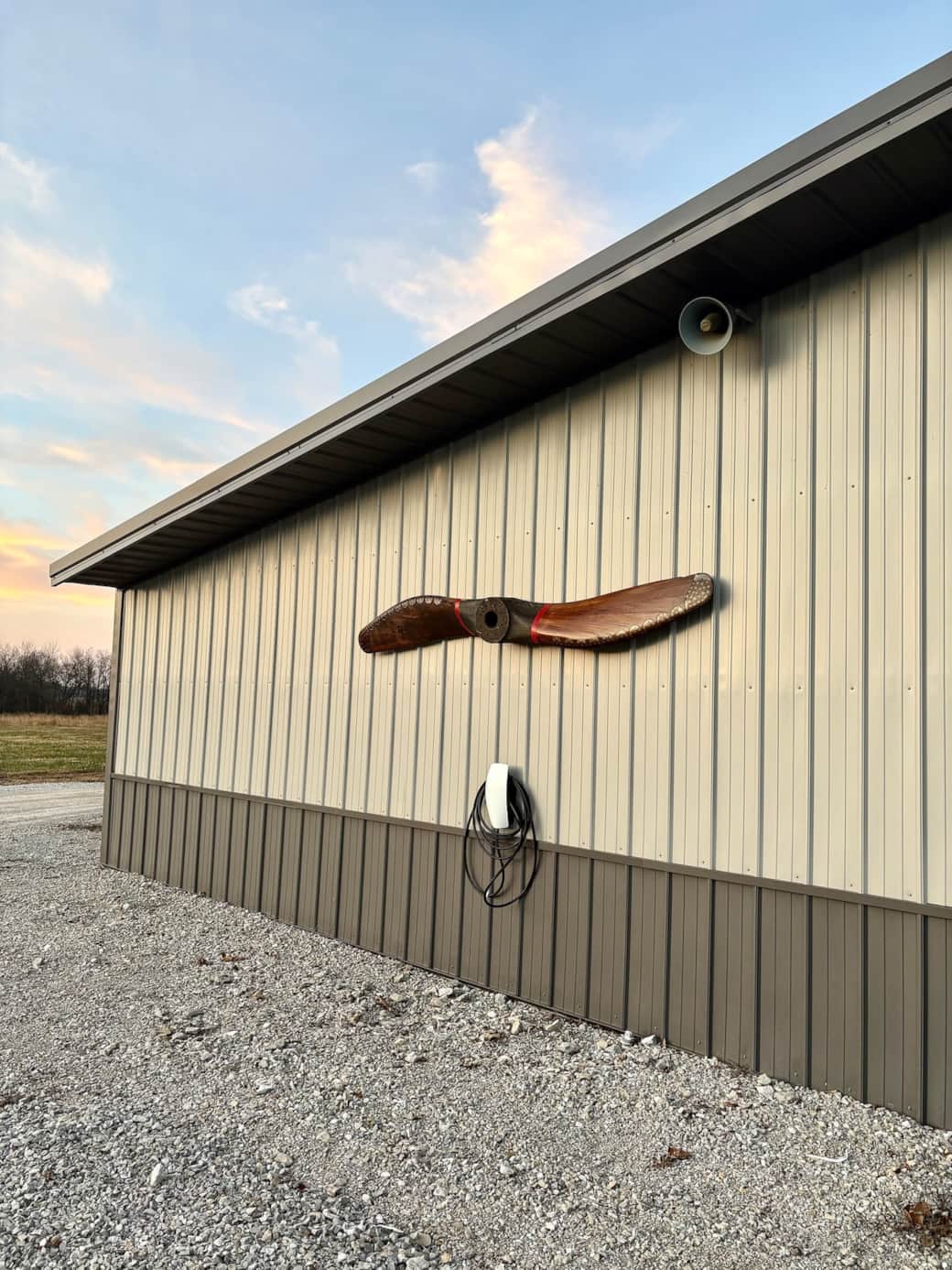 A Tesla charger mounted directly next to the front door to the guesthouse!
