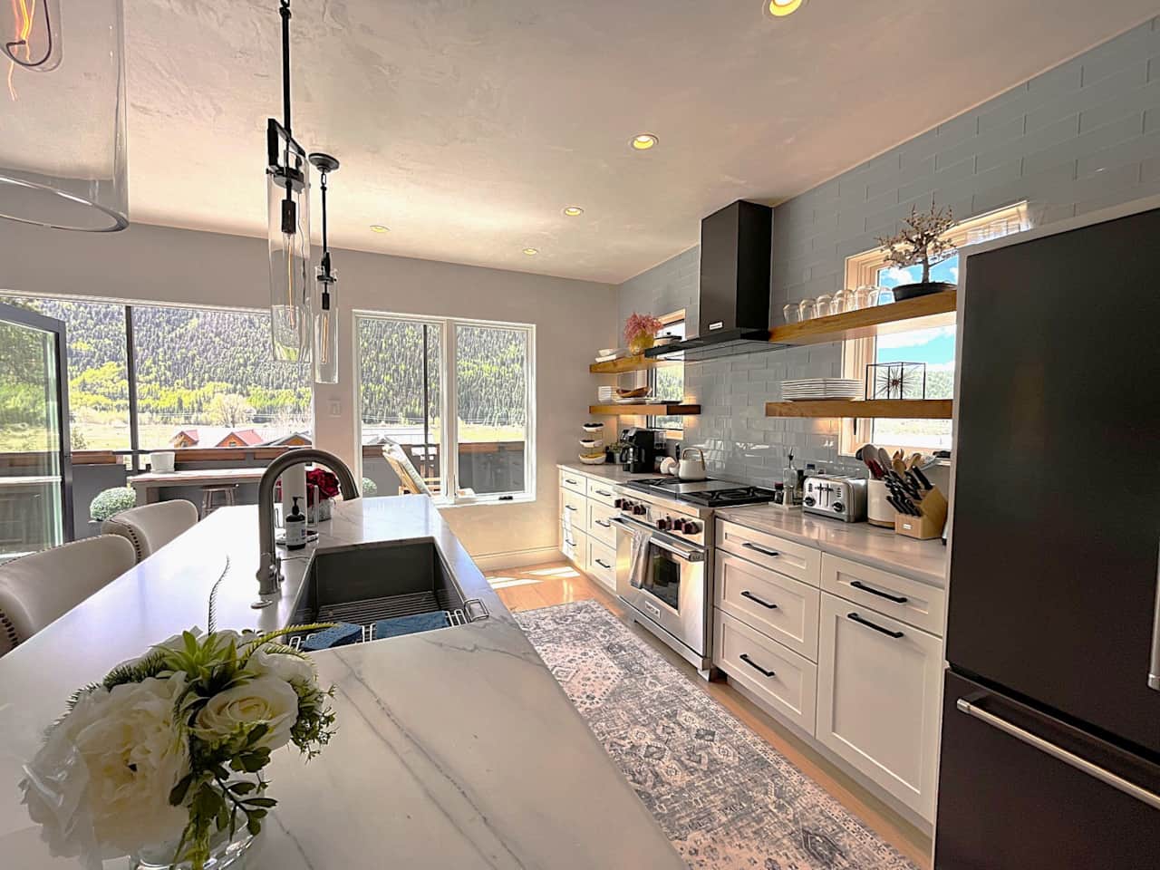 Open and light fully stocked chef's kitchen