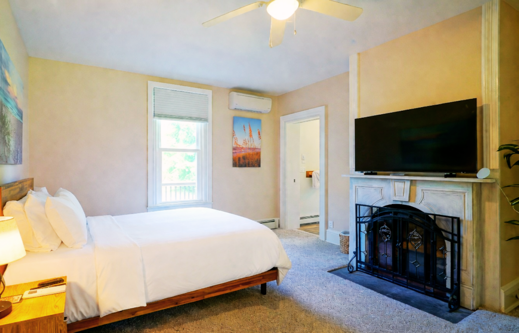 Plush purple mattresses for your stay.