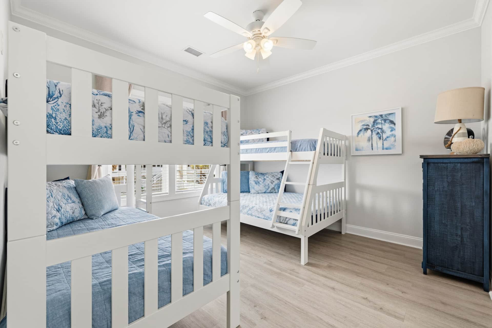 Bedroom with full bed and three twin beds
