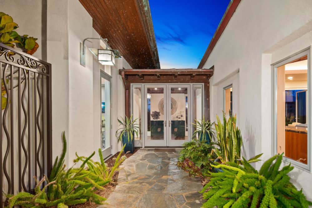 Private gated entrance courtyard at Casa de Costa Paseo in La Jolla