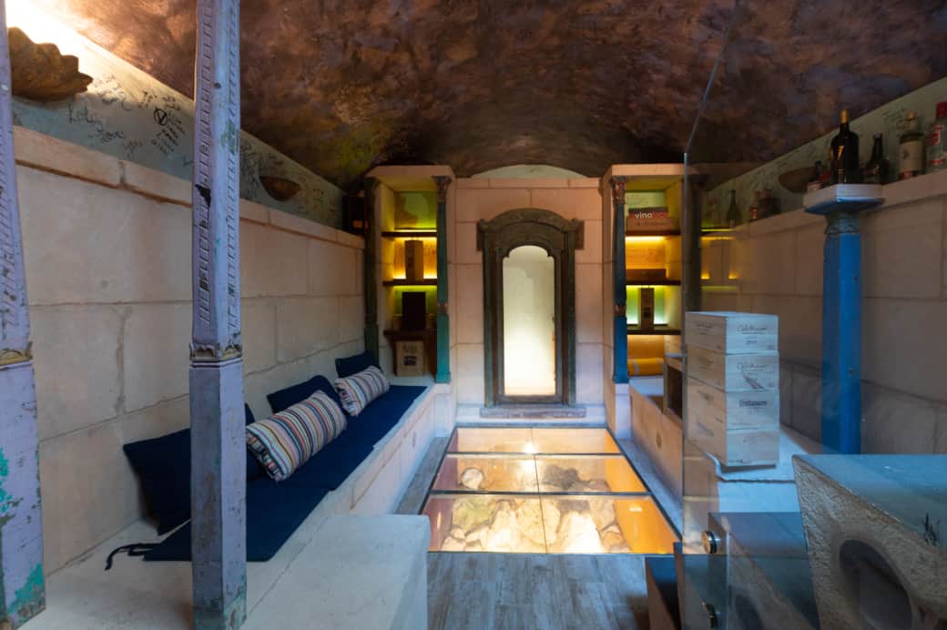 Private wine cellar and lounge area at Casa Guindilla in Portals Nous, Mallorca