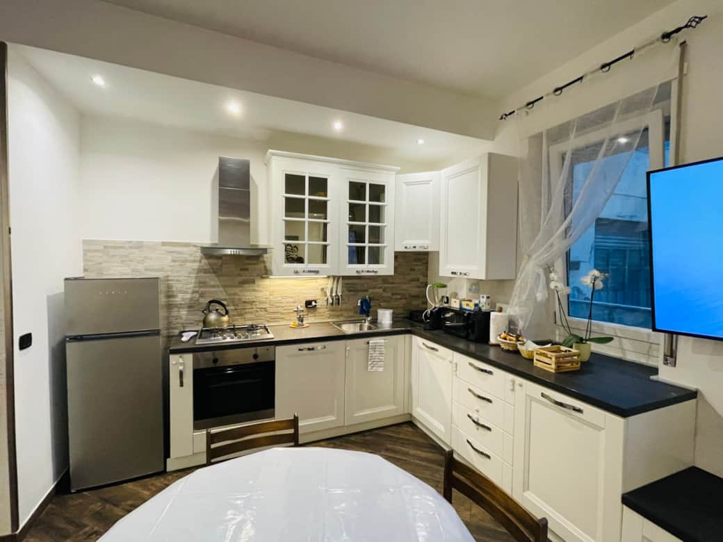 Salone con cucina_Living room and Kitchen_Salon cu Bucatarie_Зал с кухней_2