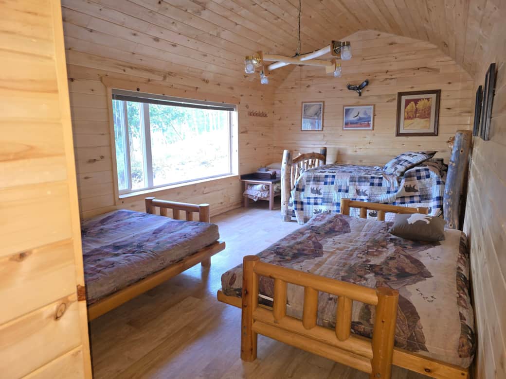 Bedroom with fold out foutons