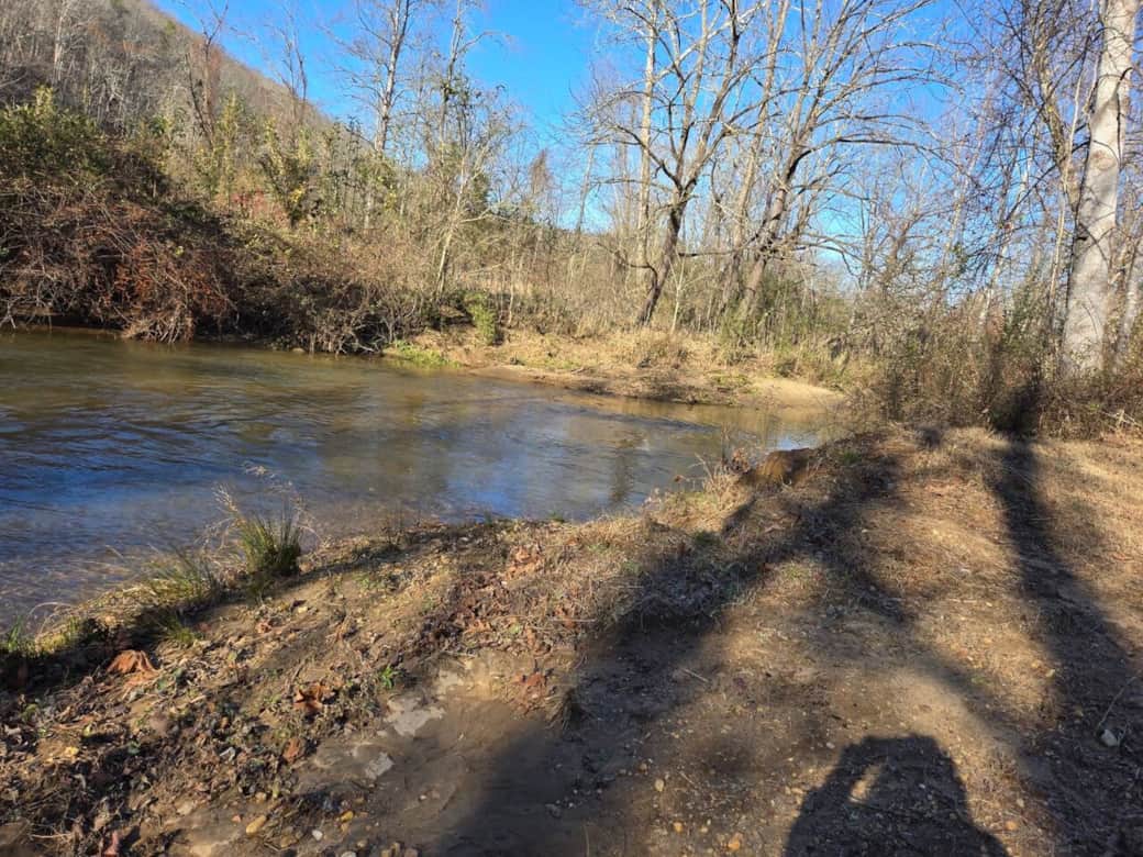 Directly on yahoola creek with private beach