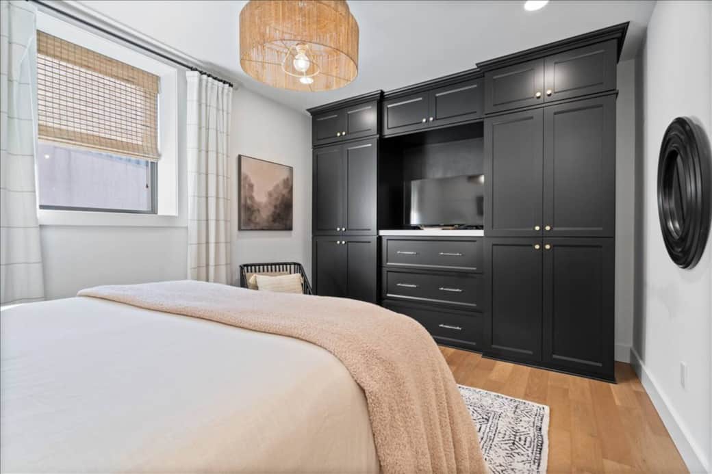 Everything in its place — built-in clothing storage keeps your space tidy and comfortable.