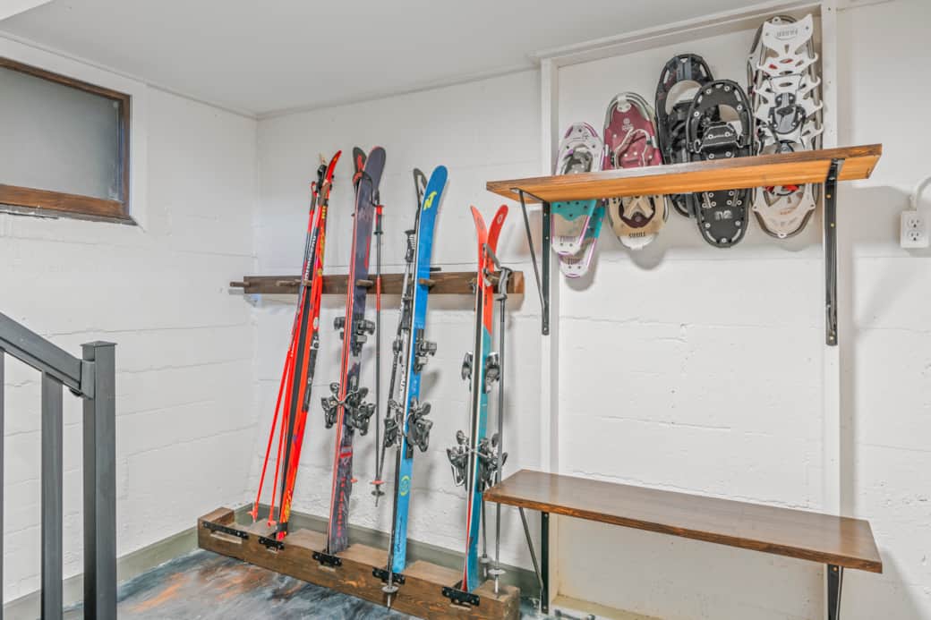Sports equipment room with boot dryer during ski season