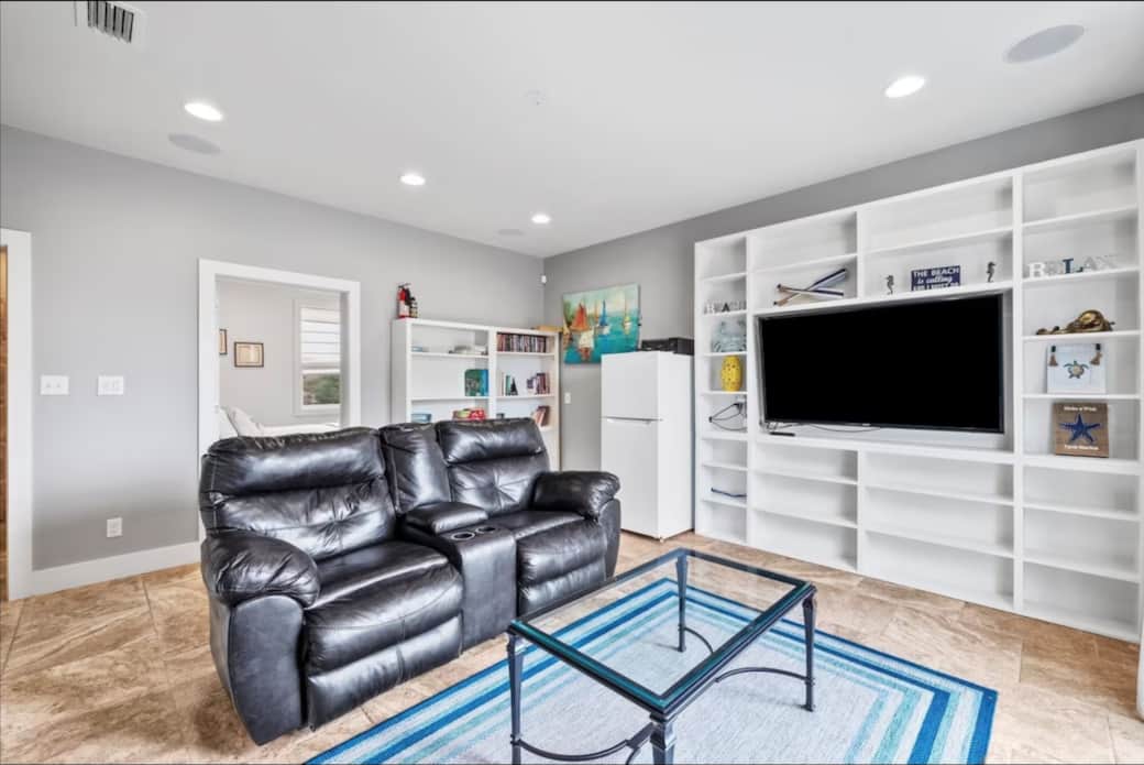 1st Floor Media Room with 65" Smart TV & Refrigerator (plus games/movies/books/puzzles)
