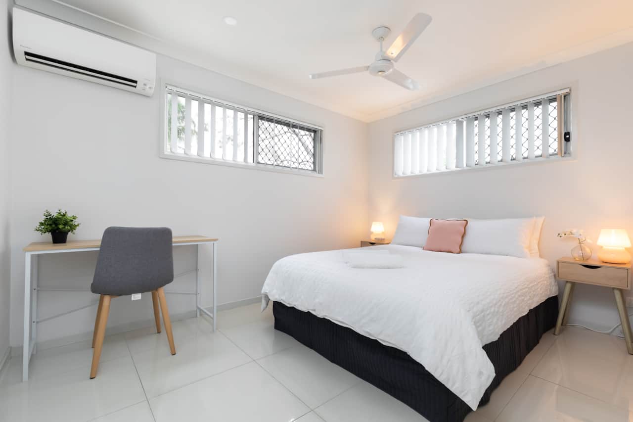Bedroom: Peaceful bedroom with cozy design and ample storage 