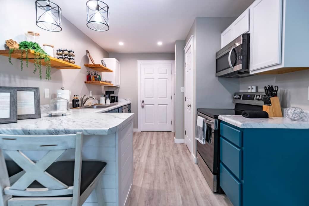 Full kitchen with stainless steel appliances and plenty of counter space for meal prep and all of the essentials you will need to prepare your favorite meal. 