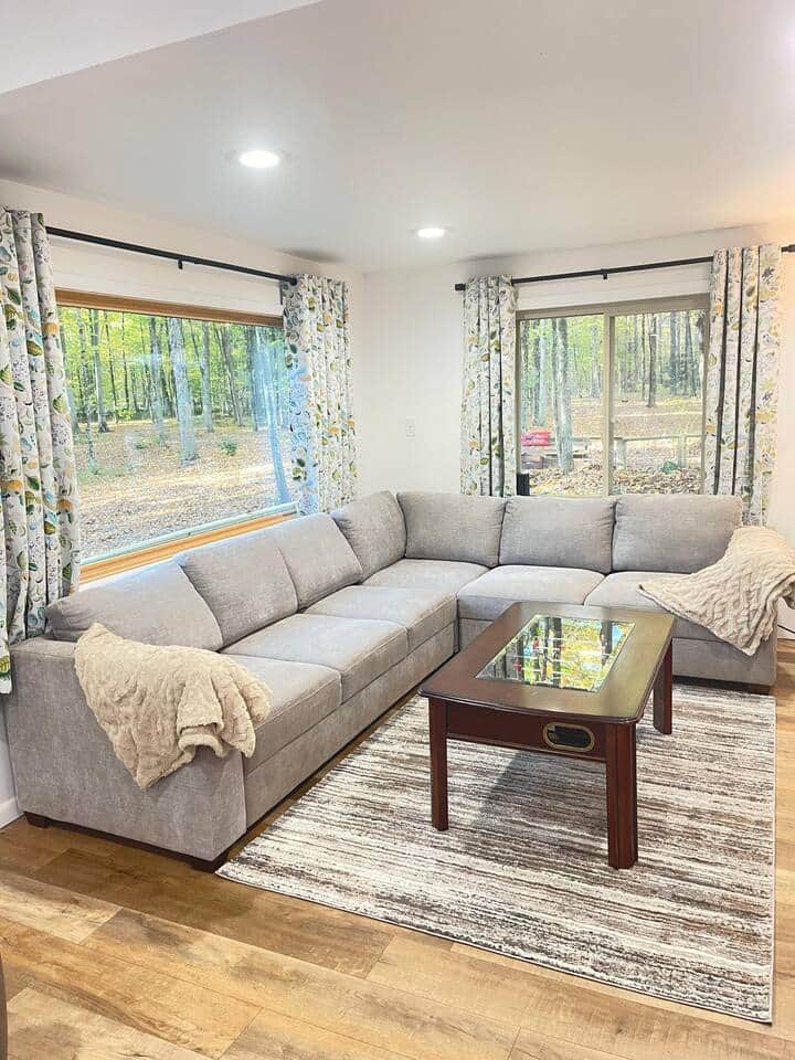 The queen-size sleeper couch offers ample room for lounging or hosting overnight guests in style