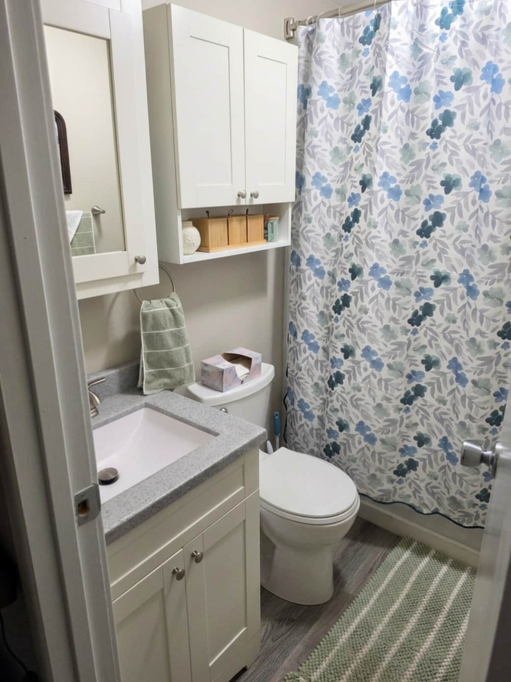 Bathroom with shower/tub. Limited travel size personal hygiene items provided.