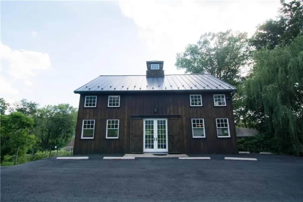Pull right up with plenty of parking to the beautiful barn home.