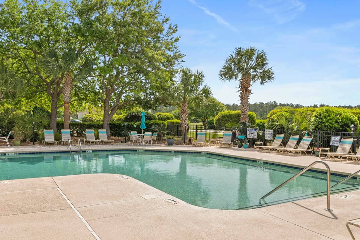 Cool off and unwind at the community pool, just steps from The 19th Hole