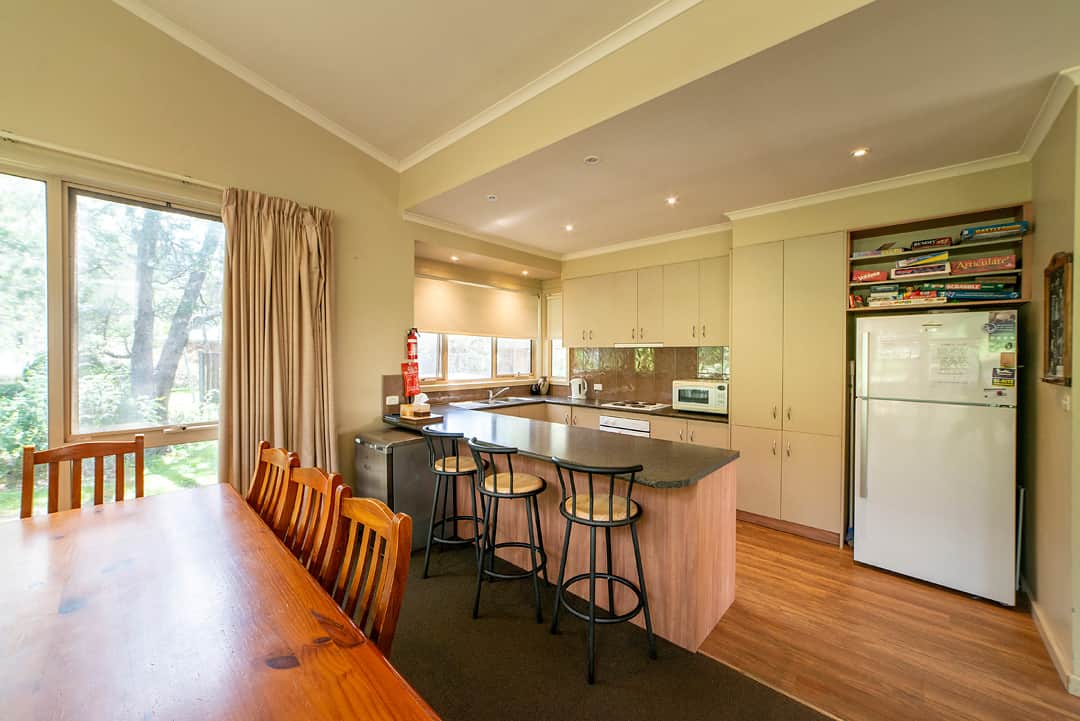 Chic kitchen with stylish bar stools, perfect for casual dining and socializing.