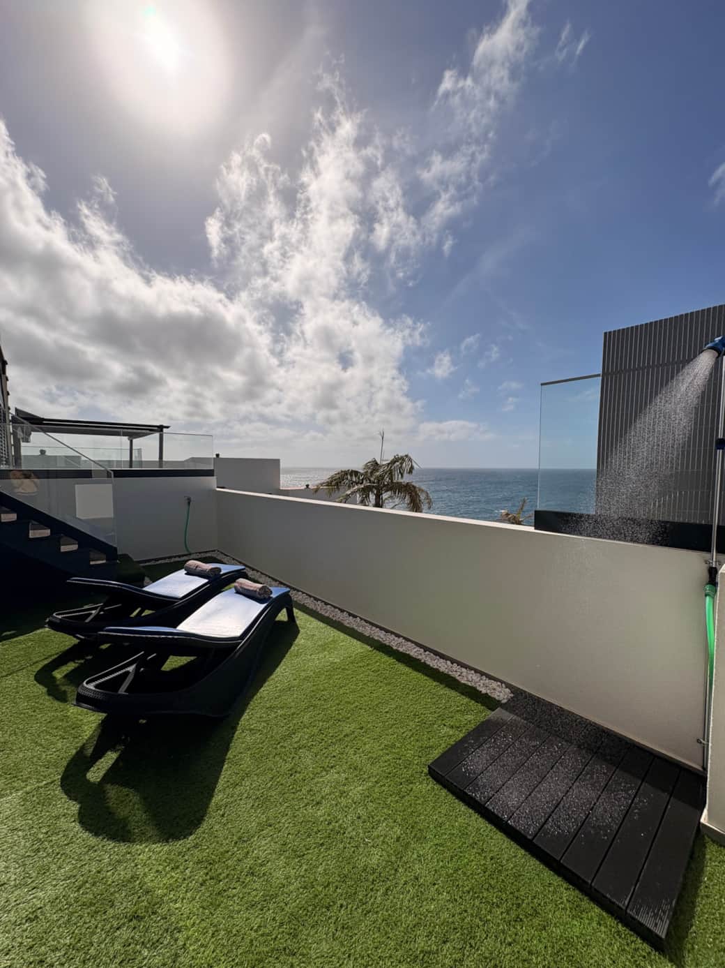 Waterfront - shower and ocean