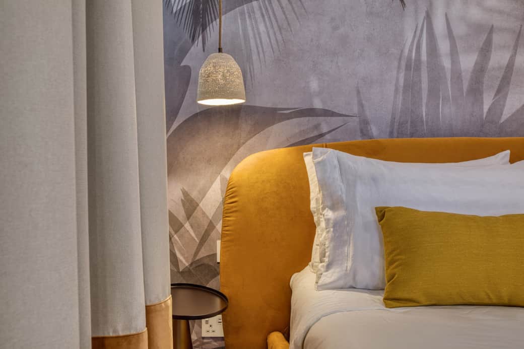 Detailed shot of the bedroom's high-end finishes.